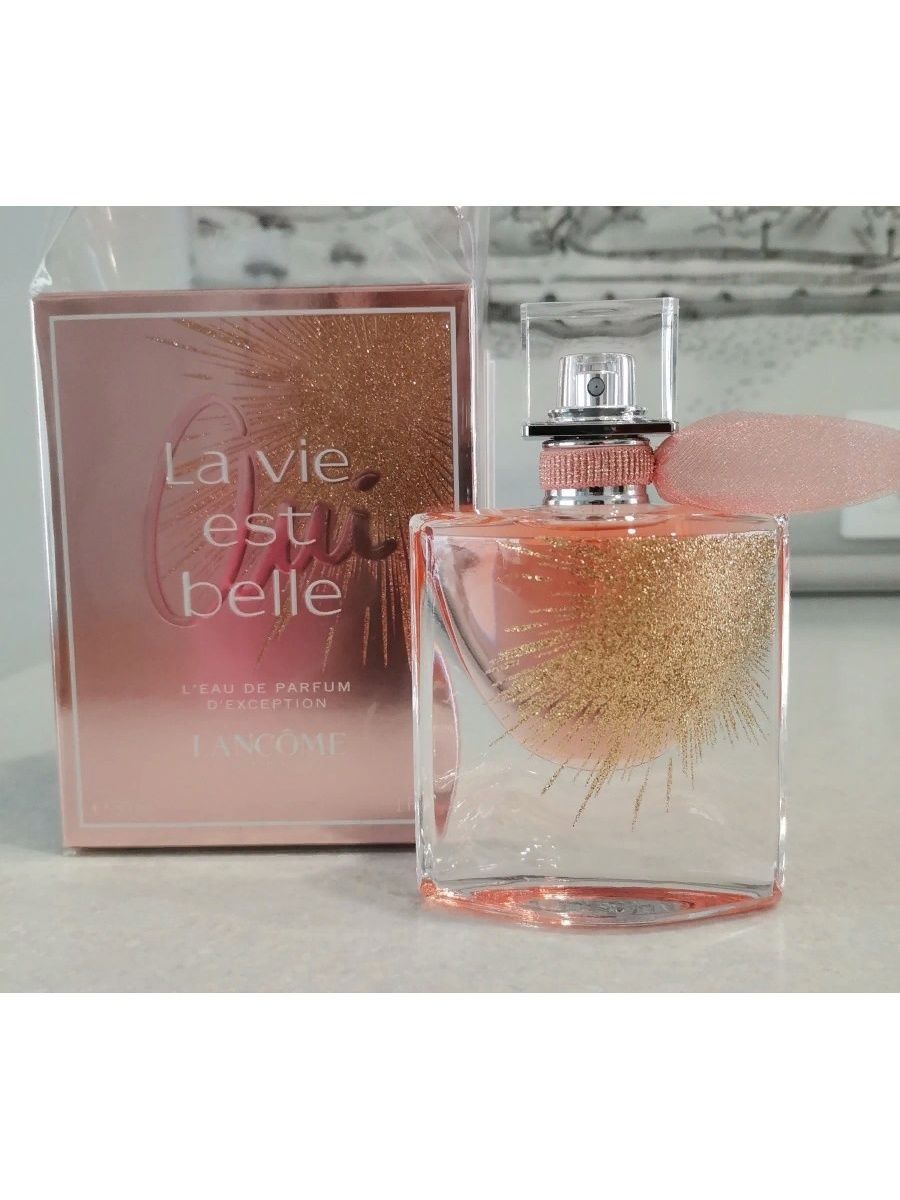 Lancome la vie belle oui. Духи ла ви э Бель. Ла ви ЭСТ Бель ланком 75мл оригинал. Духи ла ви э Бель ланком. Ланком Лавель Бель.